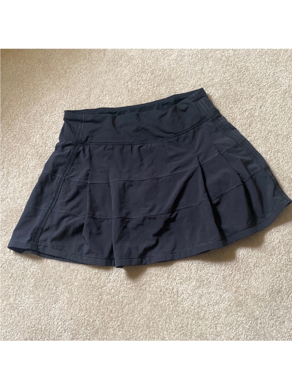 Lululemon black Athletic skirt with built-in biker shorts. Size 4